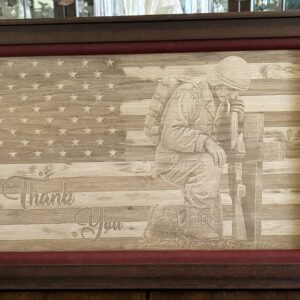 Kneeling Soldier and Flag